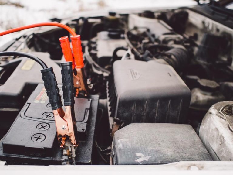 Car battery with jump leads connected